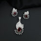 Crescent fan pendant set with geometric centerpiece detailing