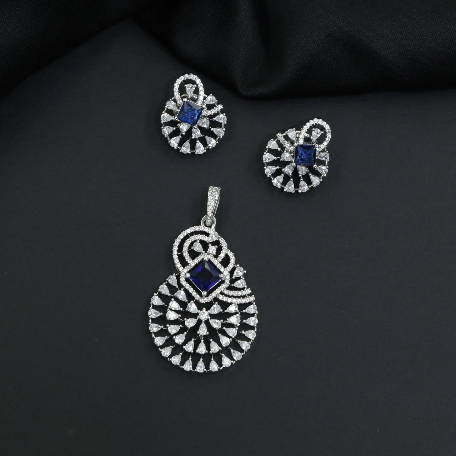 Statement drop pendant set with fan motif construction and matching earrings