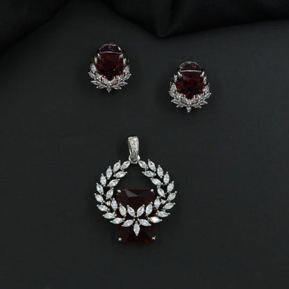 Open wreath pendant set with marquise cluster detailing and drop design