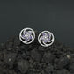Floral Pinwheel Stud Earrings with Circular Border Design