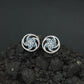 Floral Pinwheel Stud Earrings with Circular Border Design