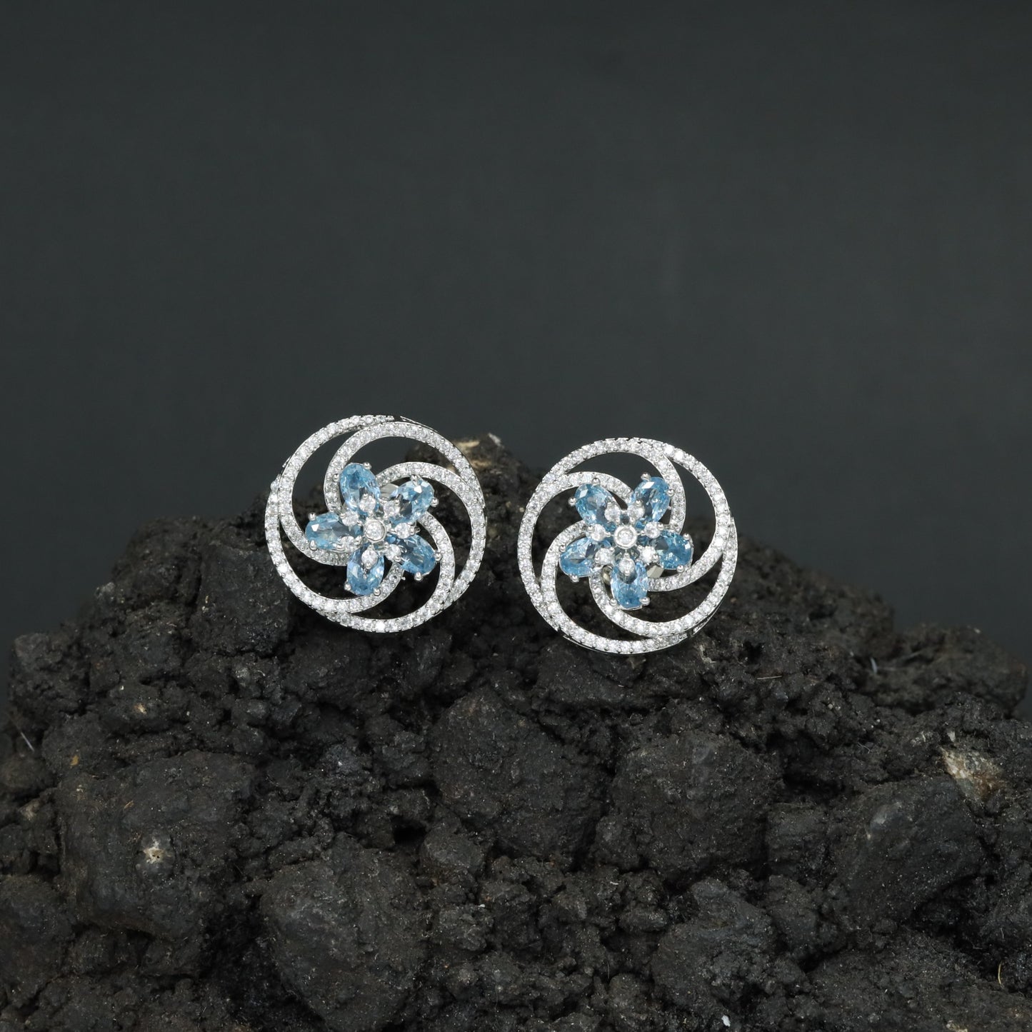 Floral Pinwheel Stud Earrings with Circular Border Design