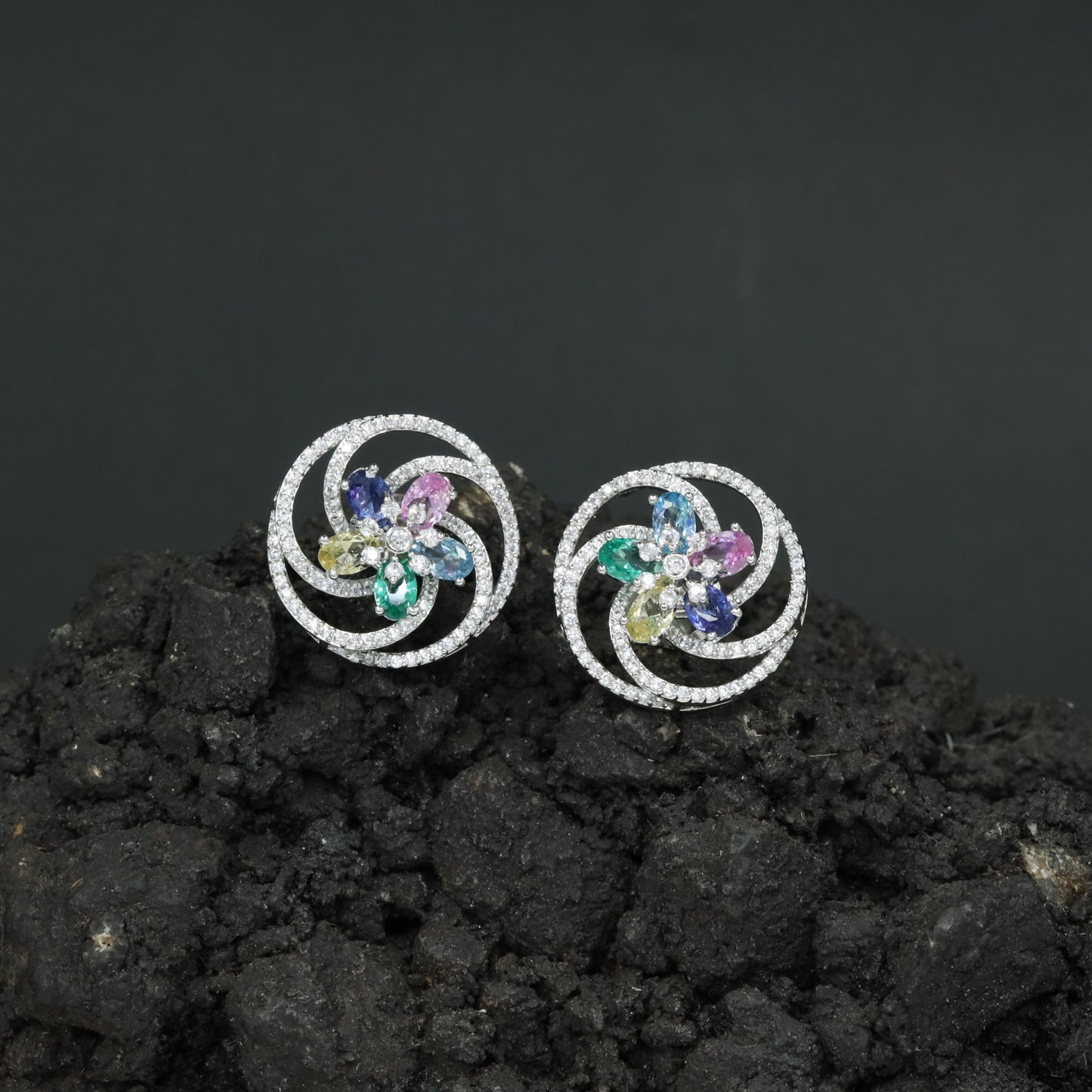 Floral Pinwheel Stud Earrings with Circular Border Design