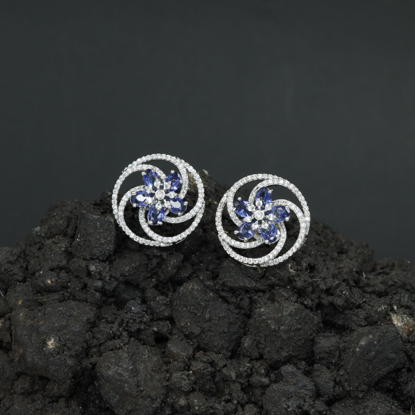 Floral Pinwheel Stud Earrings with Circular Border Design