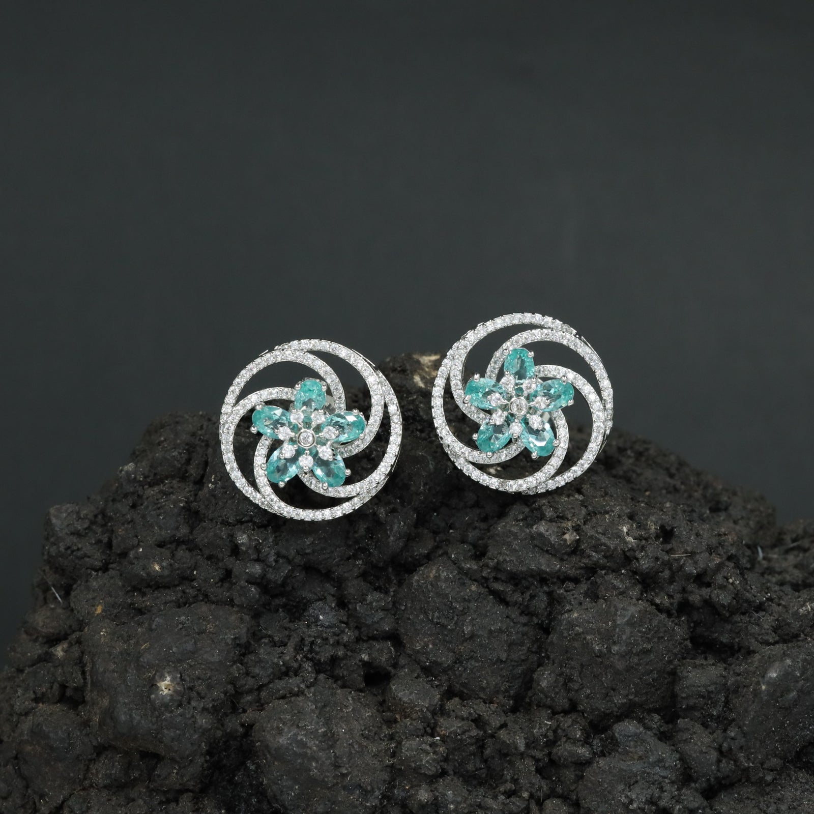 Floral Pinwheel Stud Earrings with Circular Border Design