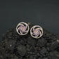 Floral Pinwheel Stud Earrings with Circular Border Design