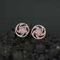 Floral Pinwheel Stud Earrings with Circular Border Design