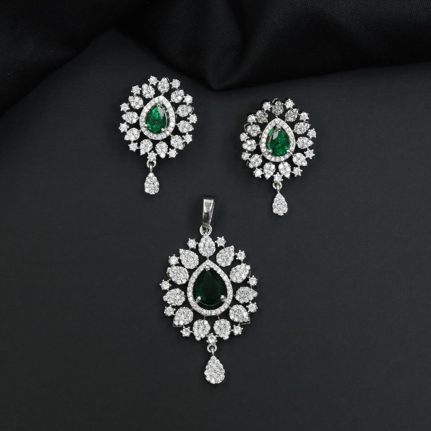Contemporary pendant set with floral cluster craftsmanship and matching earrings