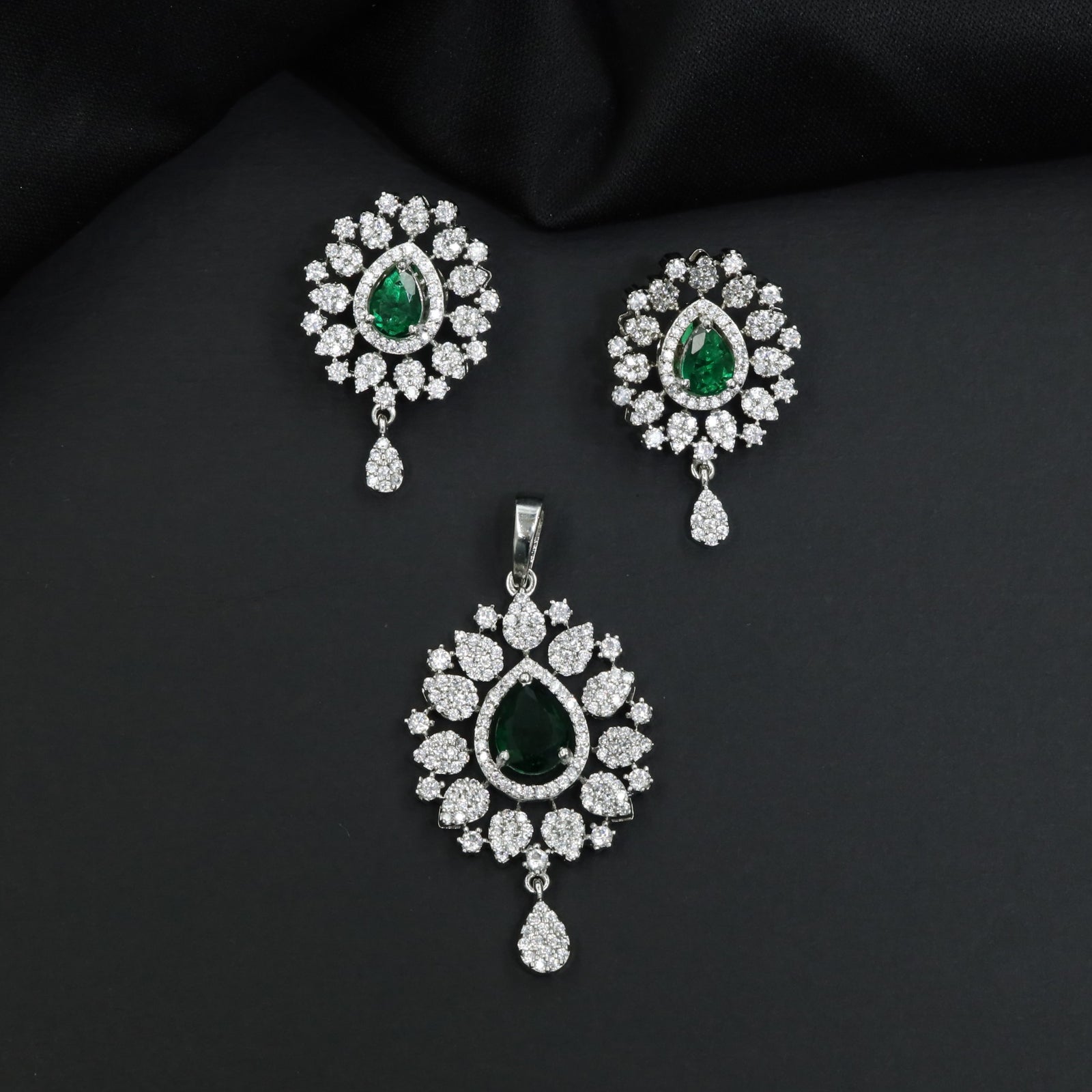 Contemporary pendant set with floral cluster craftsmanship and matching earrings