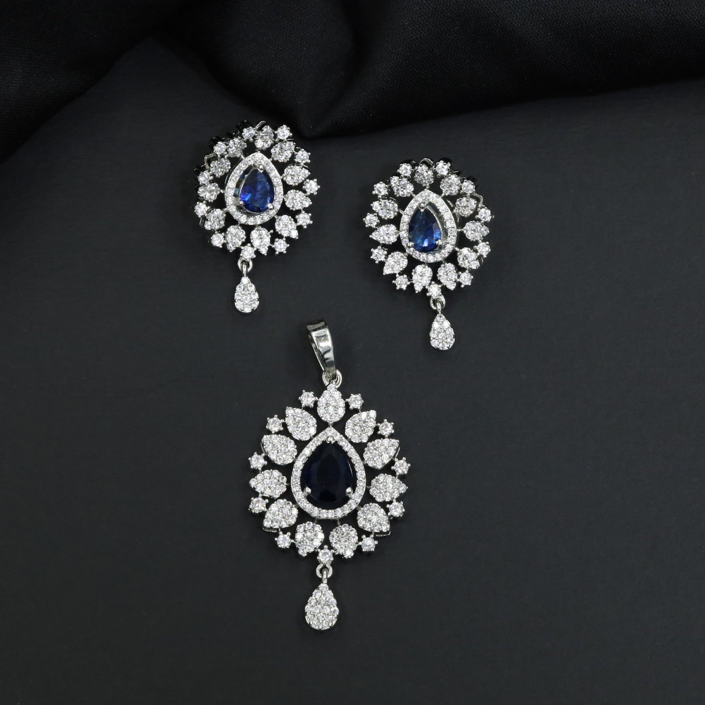 Contemporary pendant set with floral cluster craftsmanship and matching earrings