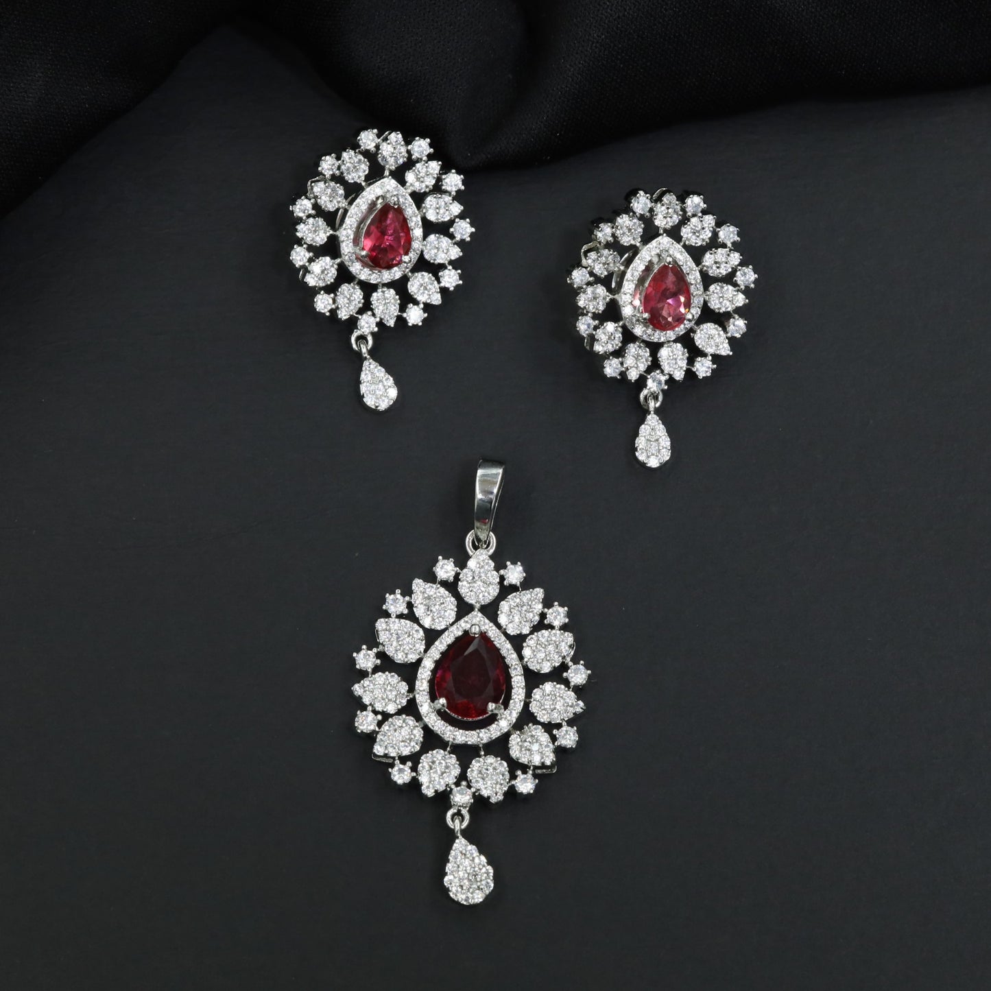 Contemporary pendant set with floral cluster craftsmanship and matching earrings