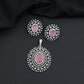 Rhodium finish pendant set with oval drop and radiant border design