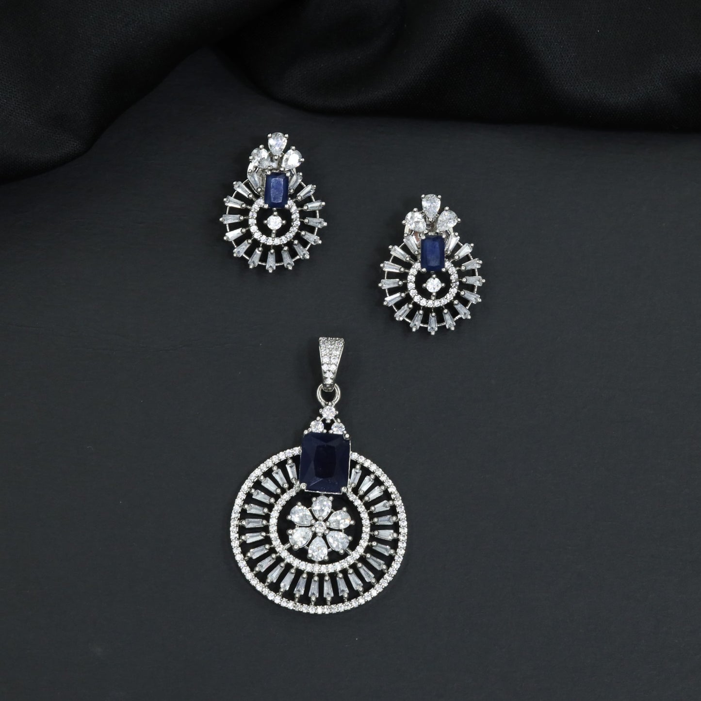 Classic circular pendant set with detailed medallion styling