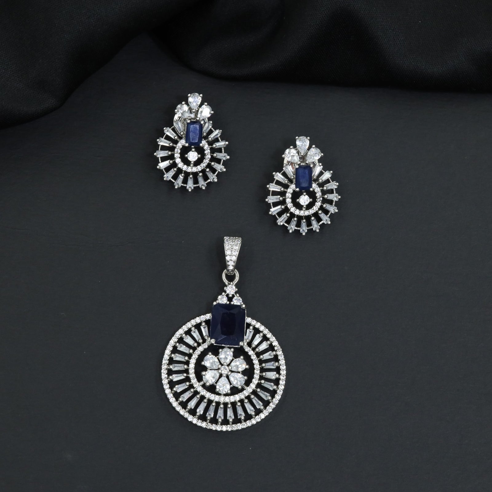 Classic circular pendant set with detailed medallion styling