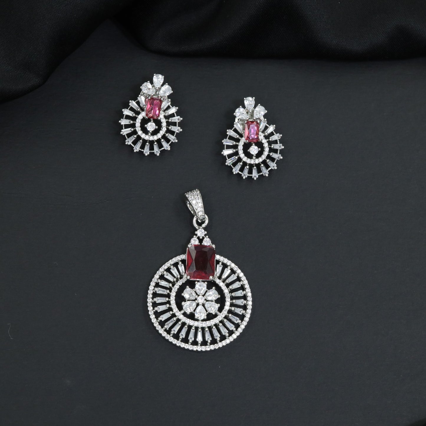 Classic circular pendant set with detailed medallion styling