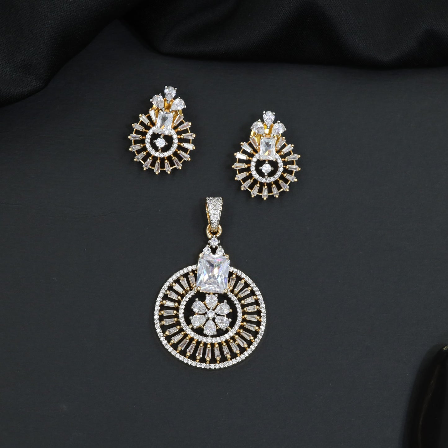 Classic circular pendant set with detailed medallion styling