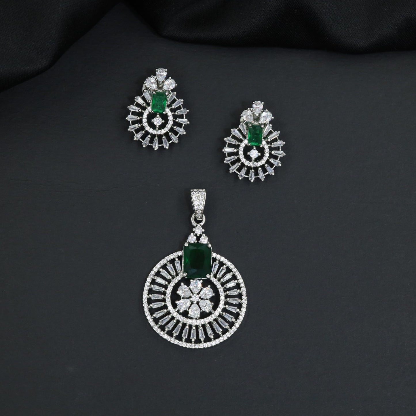 Classic circular pendant set with detailed medallion styling