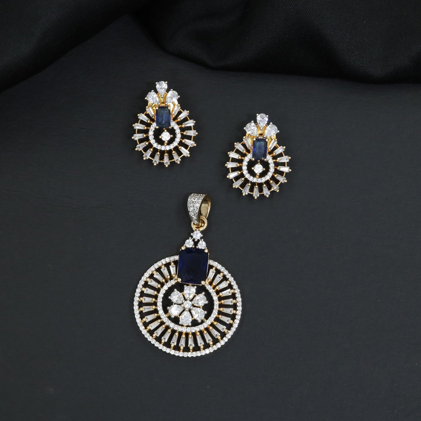 Classic circular pendant set with detailed medallion styling
