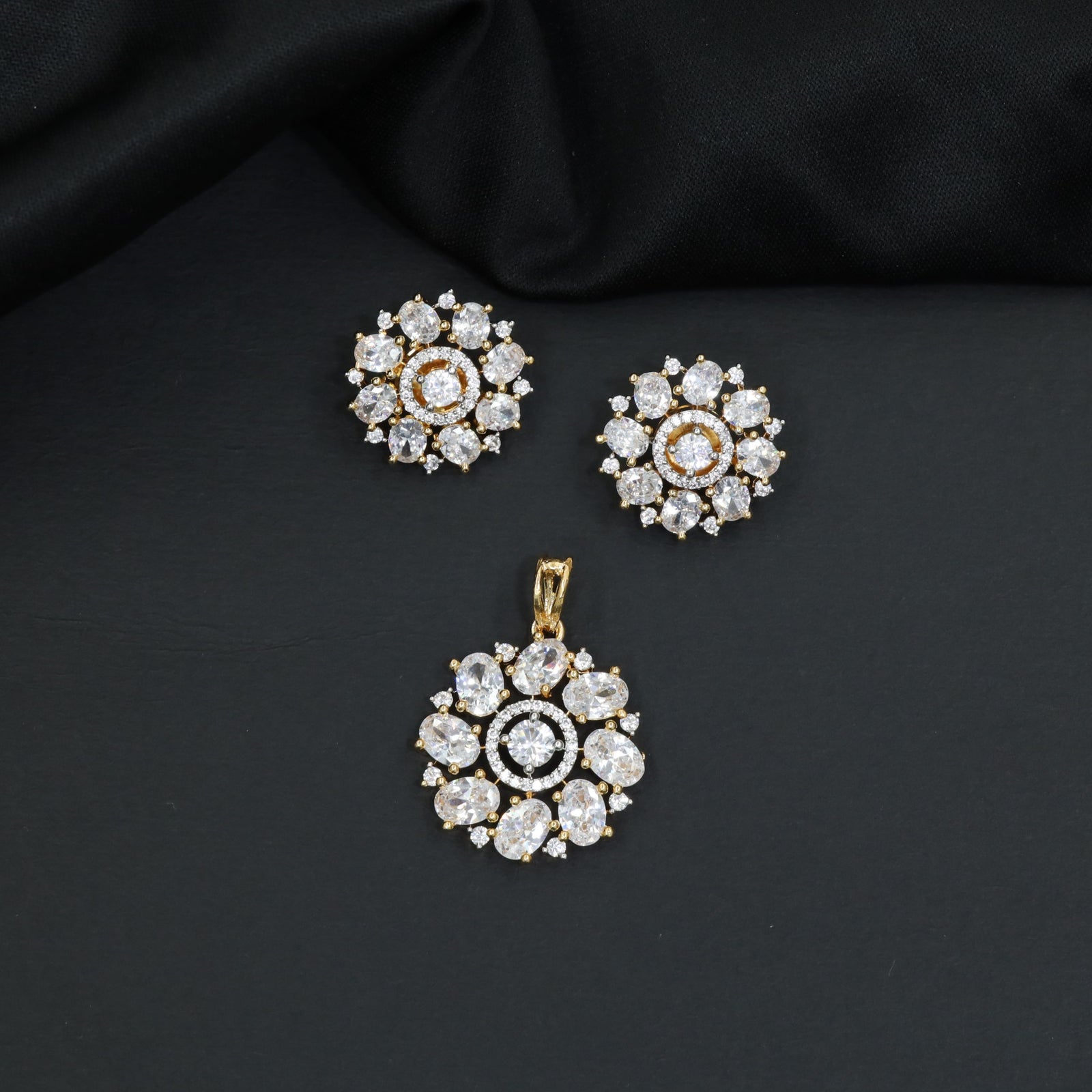 Elegant round pendant set with flower cluster and halo accents