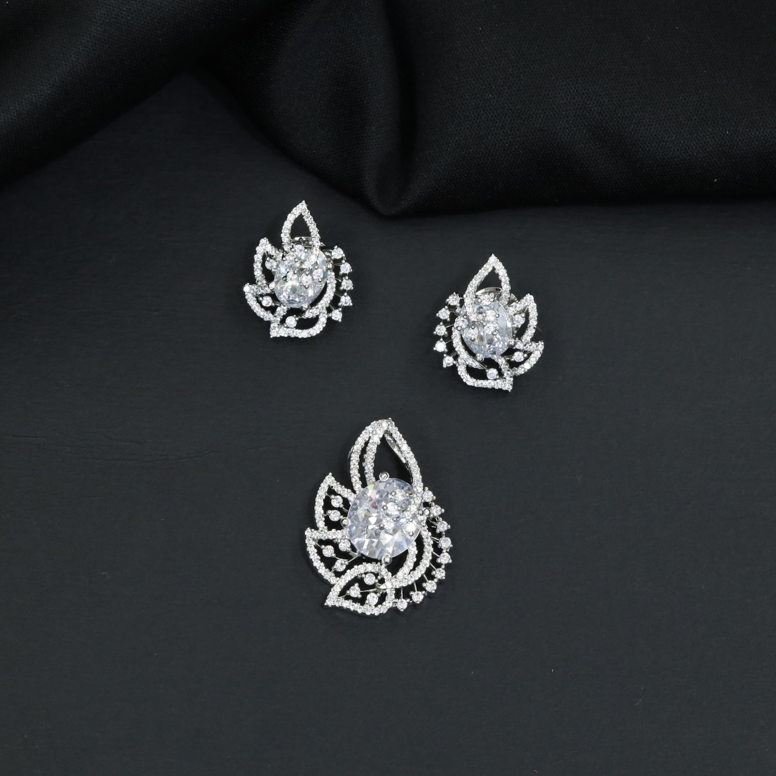 Designer pendant set with botanical patterns and halo accents