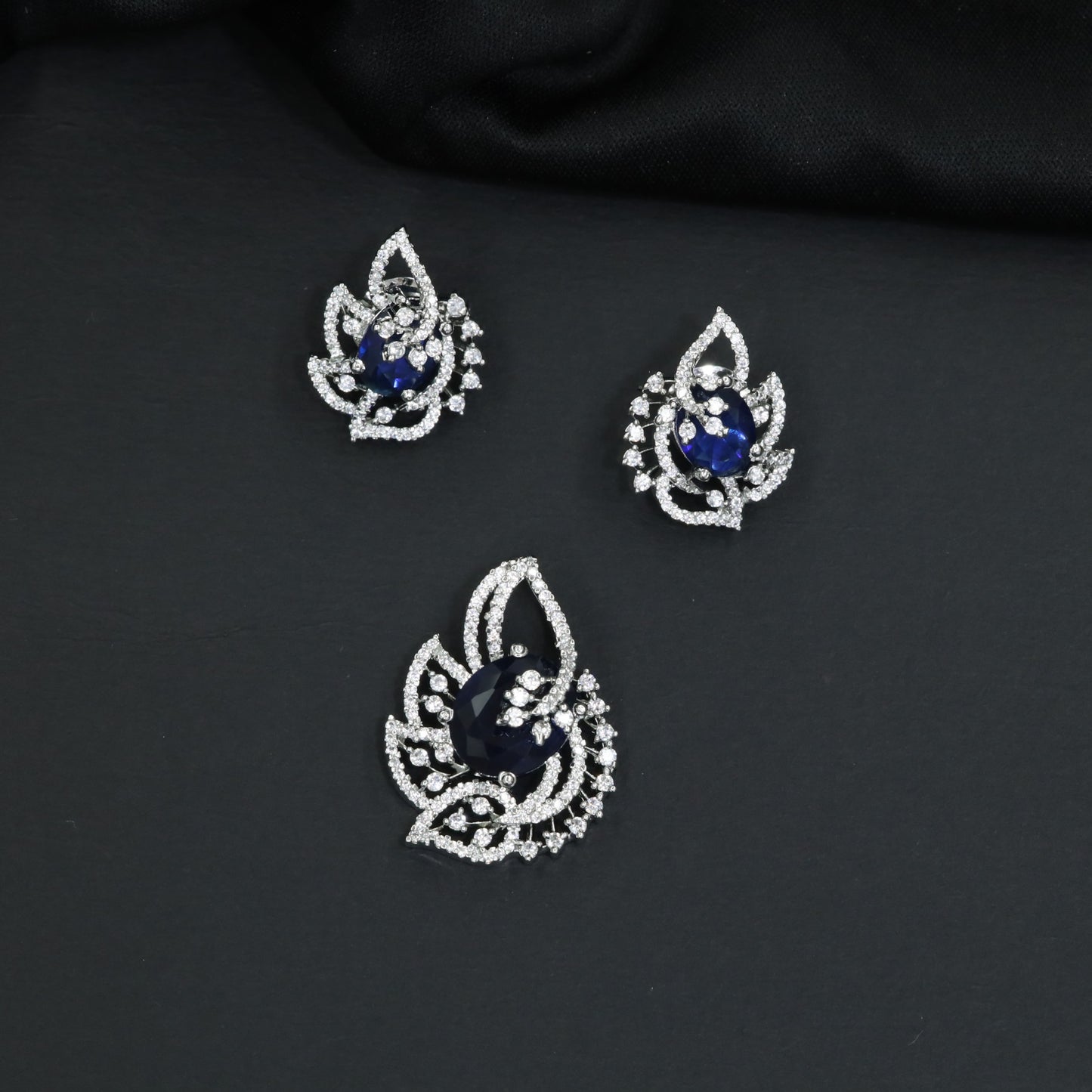 Designer pendant set with botanical patterns and halo accents
