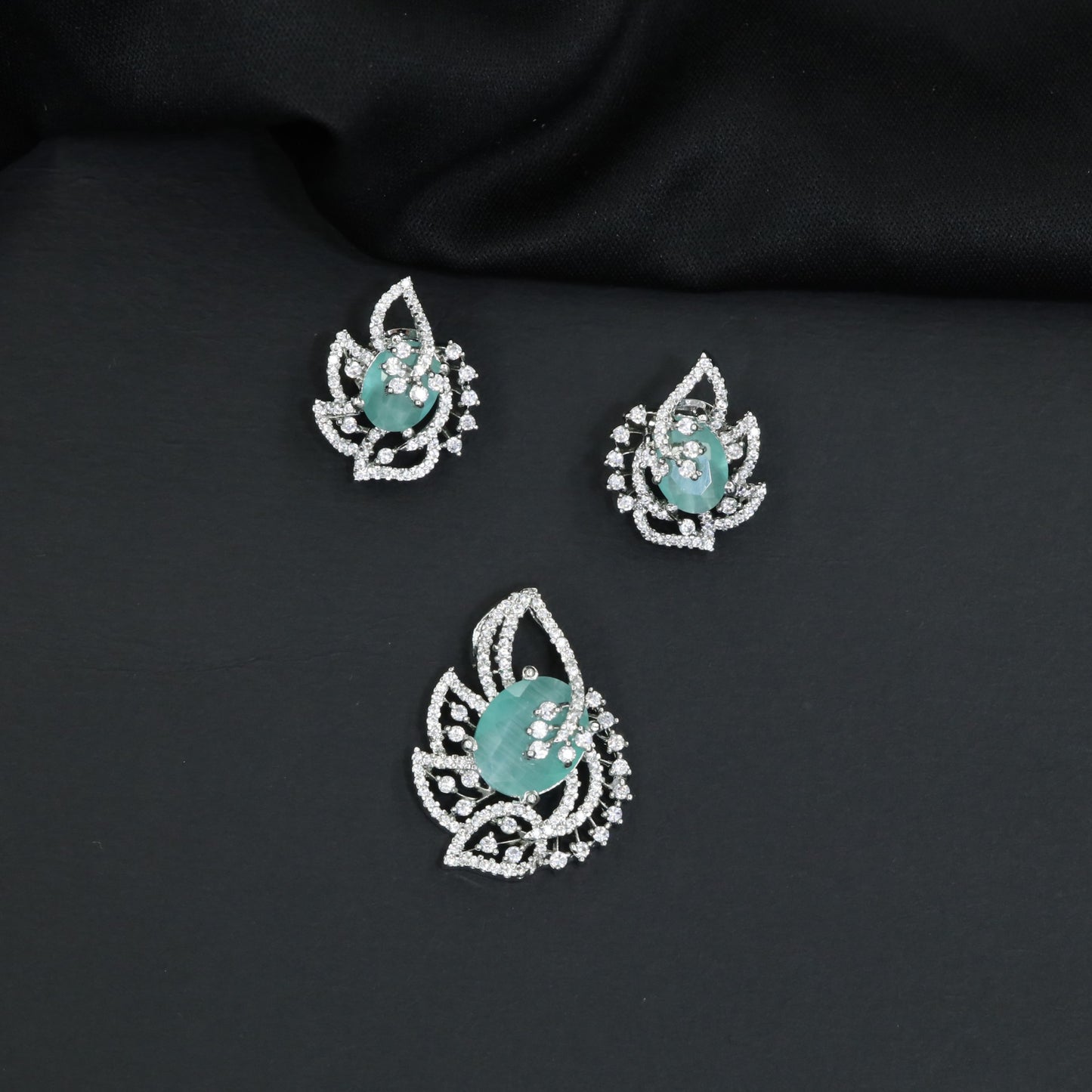 Designer pendant set with botanical patterns and halo accents