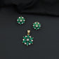 Floral bloom pendant set with marquise petal detailing and matching stud earrings