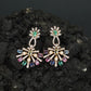 Sunray Pattern Hanging Earrings with Pearl Accent Design