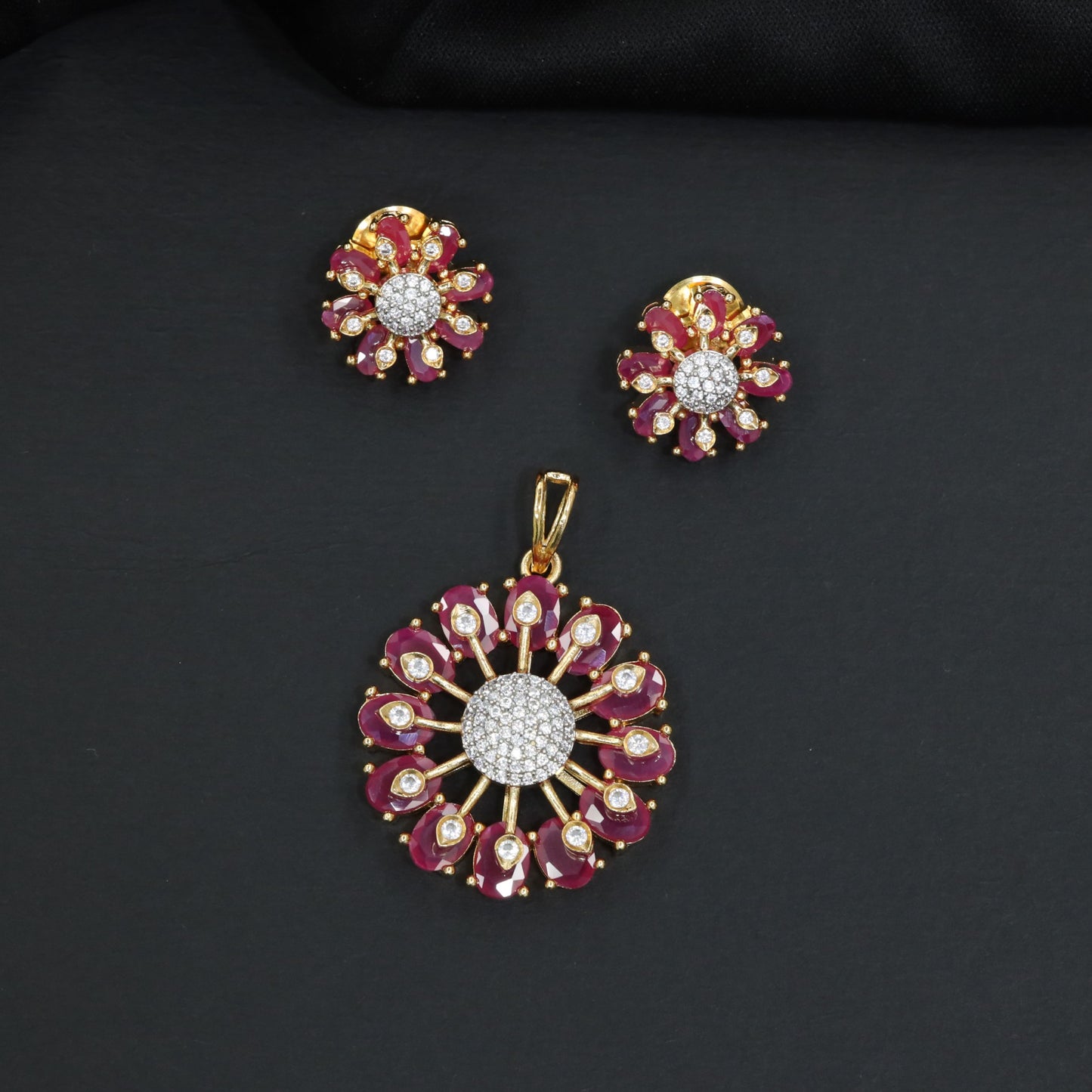 Designer pendant set with circular floral craftsmanship and radiating petal formations