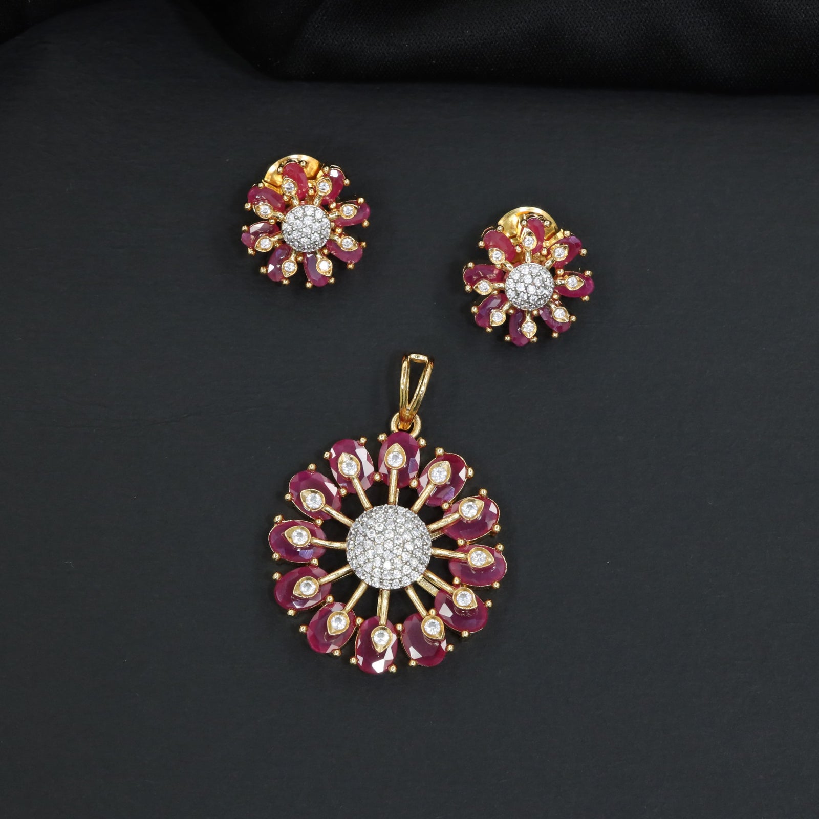 Designer pendant set with circular floral craftsmanship and radiating petal formations