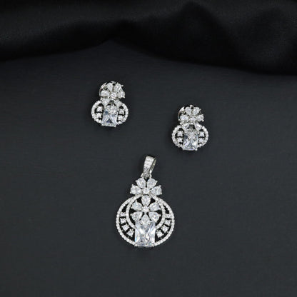Contemporary floral pendant set showcasing geometric styling and petal cluster accents