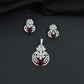 Contemporary floral pendant set showcasing geometric styling and petal cluster accents