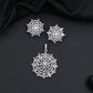 Elegant flower pendant set with layered floral construction and statement centerpiece