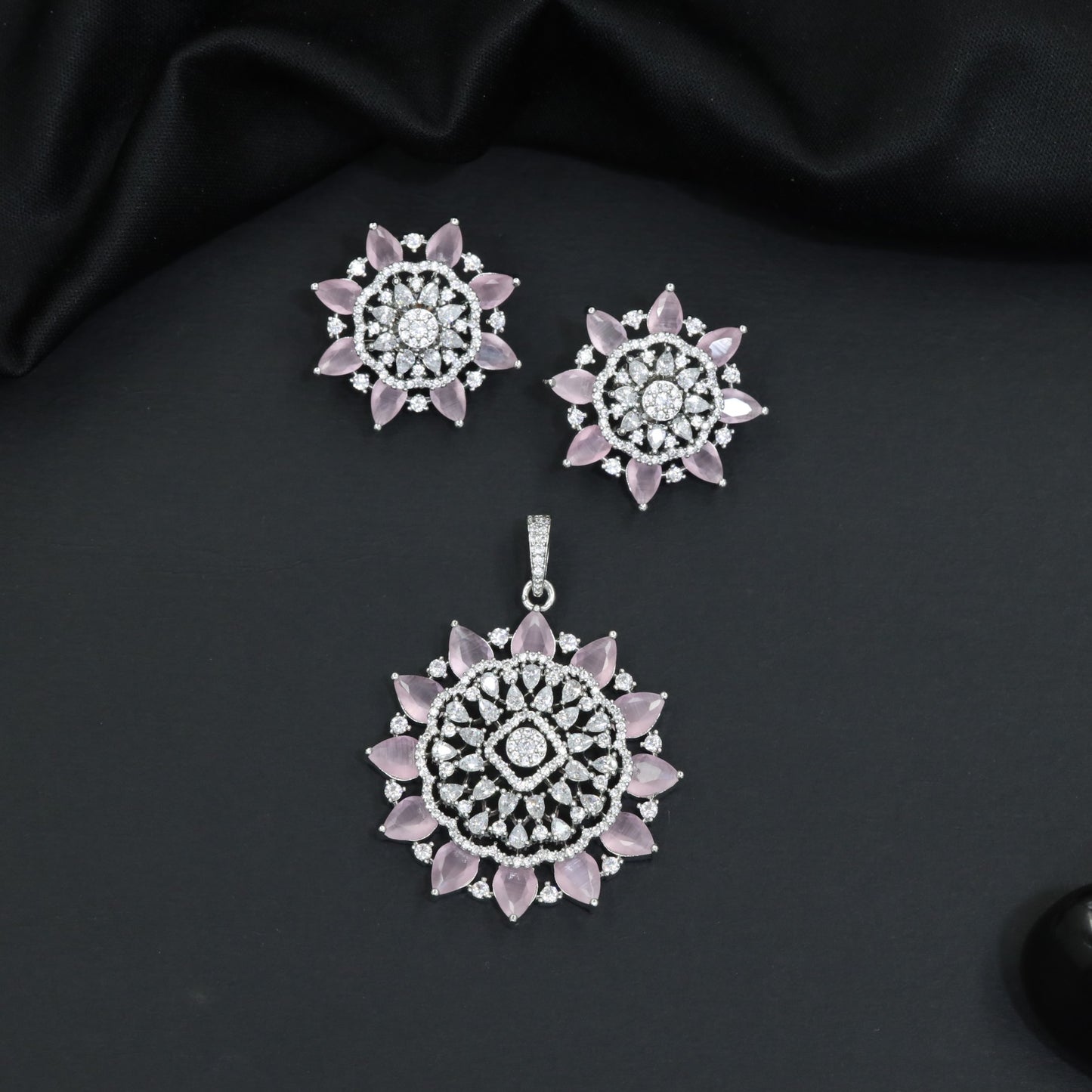 Elegant flower pendant set with layered floral construction and statement centerpiece
