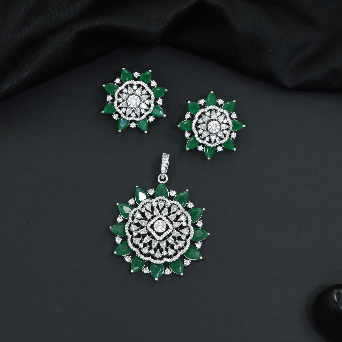 Elegant flower pendant set with layered floral construction and statement centerpiece