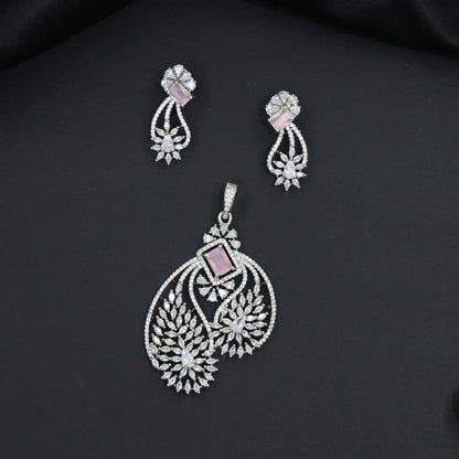 Artistic floral pendant set featuring twin leaf silhouettes and layered flower clusters