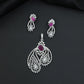 Artistic floral pendant set featuring twin leaf silhouettes and layered flower clusters