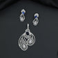 Artistic floral pendant set featuring twin leaf silhouettes and layered flower clusters