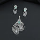 Artistic floral pendant set featuring twin leaf silhouettes and layered flower clusters
