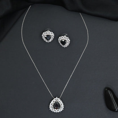 Elegant pendant chain set with a floral burst frame and teardrop focal element