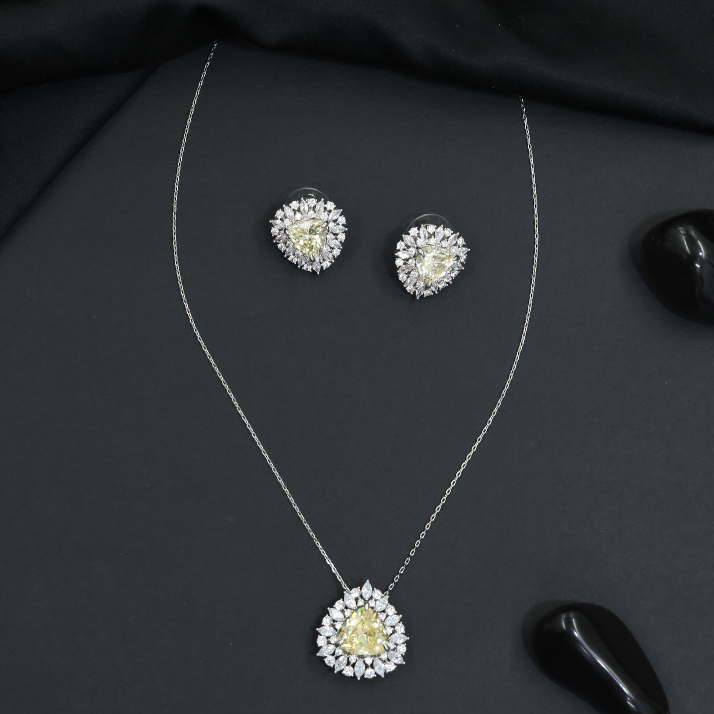 Elegant pendant chain set with a floral burst frame and teardrop focal element
