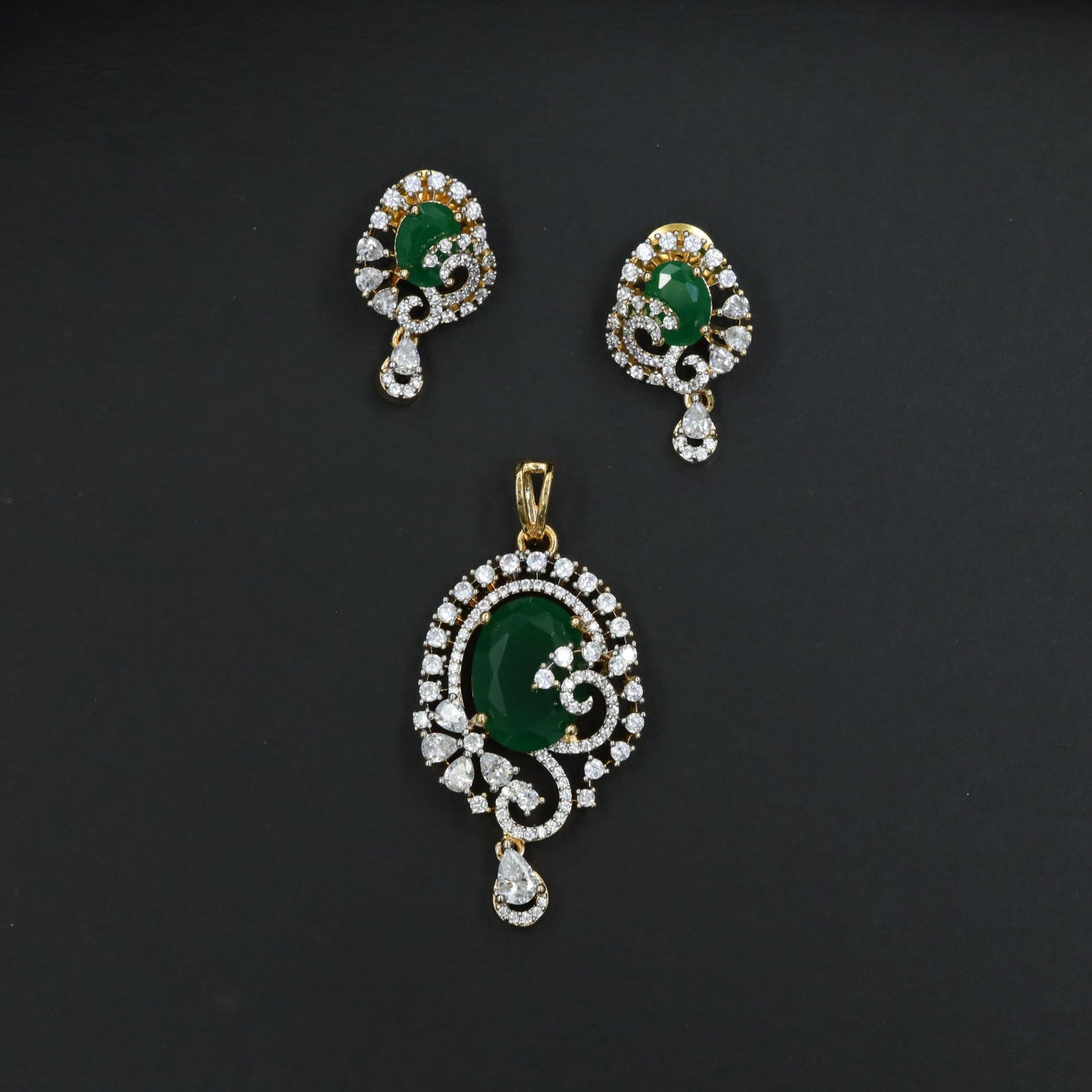 Statement floral pendant set showcasing curved vine craftsmanship and petal clusters