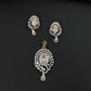 Statement floral pendant set showcasing curved vine craftsmanship and petal clusters