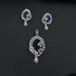Statement floral pendant set showcasing curved vine craftsmanship and petal clusters