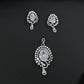 Statement floral pendant set showcasing curved vine craftsmanship and petal clusters