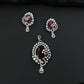 Statement floral pendant set showcasing curved vine craftsmanship and petal clusters