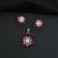 Statement floral pendant set featuring a flower bloom centerpiece and circular petal arrangement