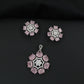 Statement floral pendant set featuring a flower bloom centerpiece and circular petal arrangement