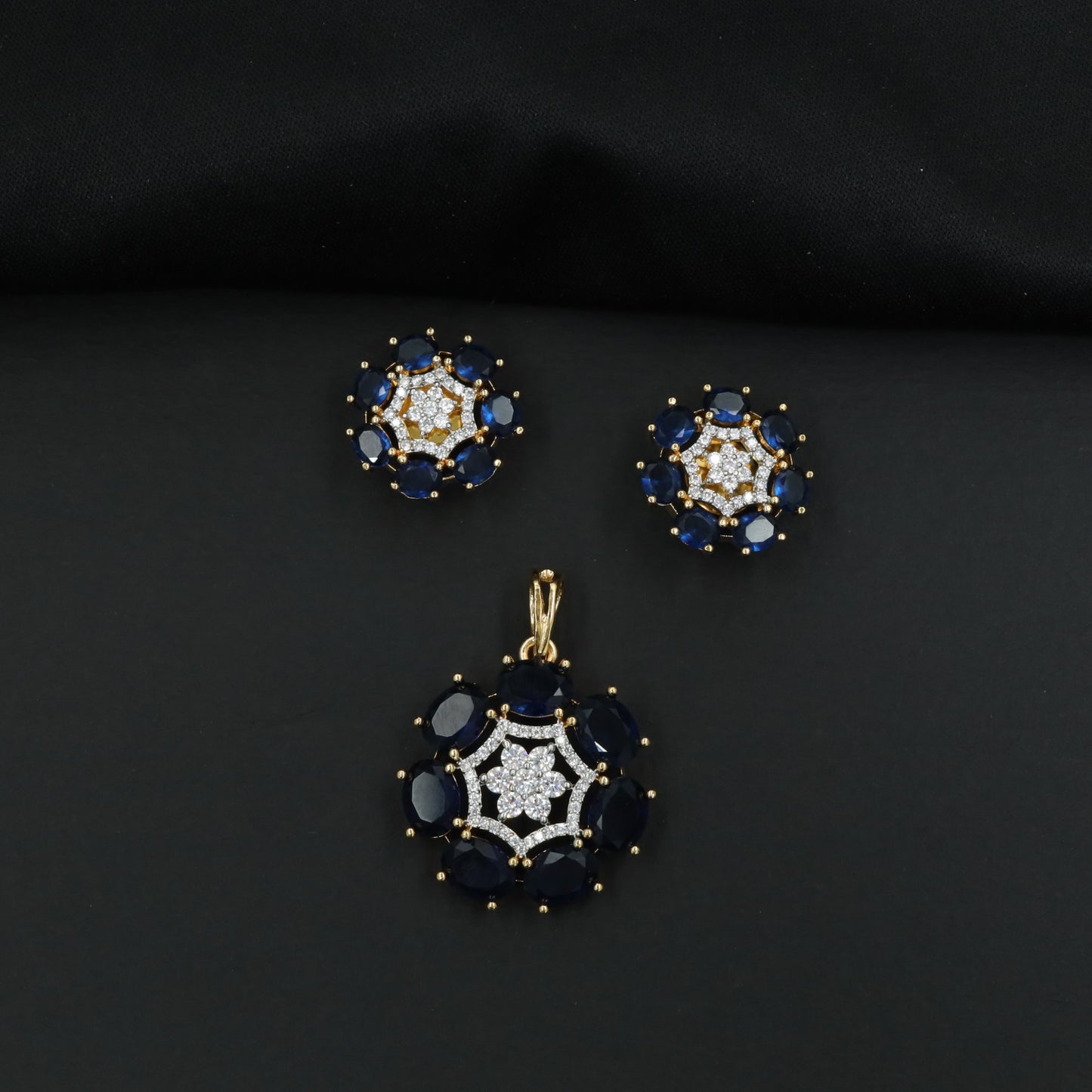 Statement floral pendant set featuring a flower bloom centerpiece and circular petal arrangement