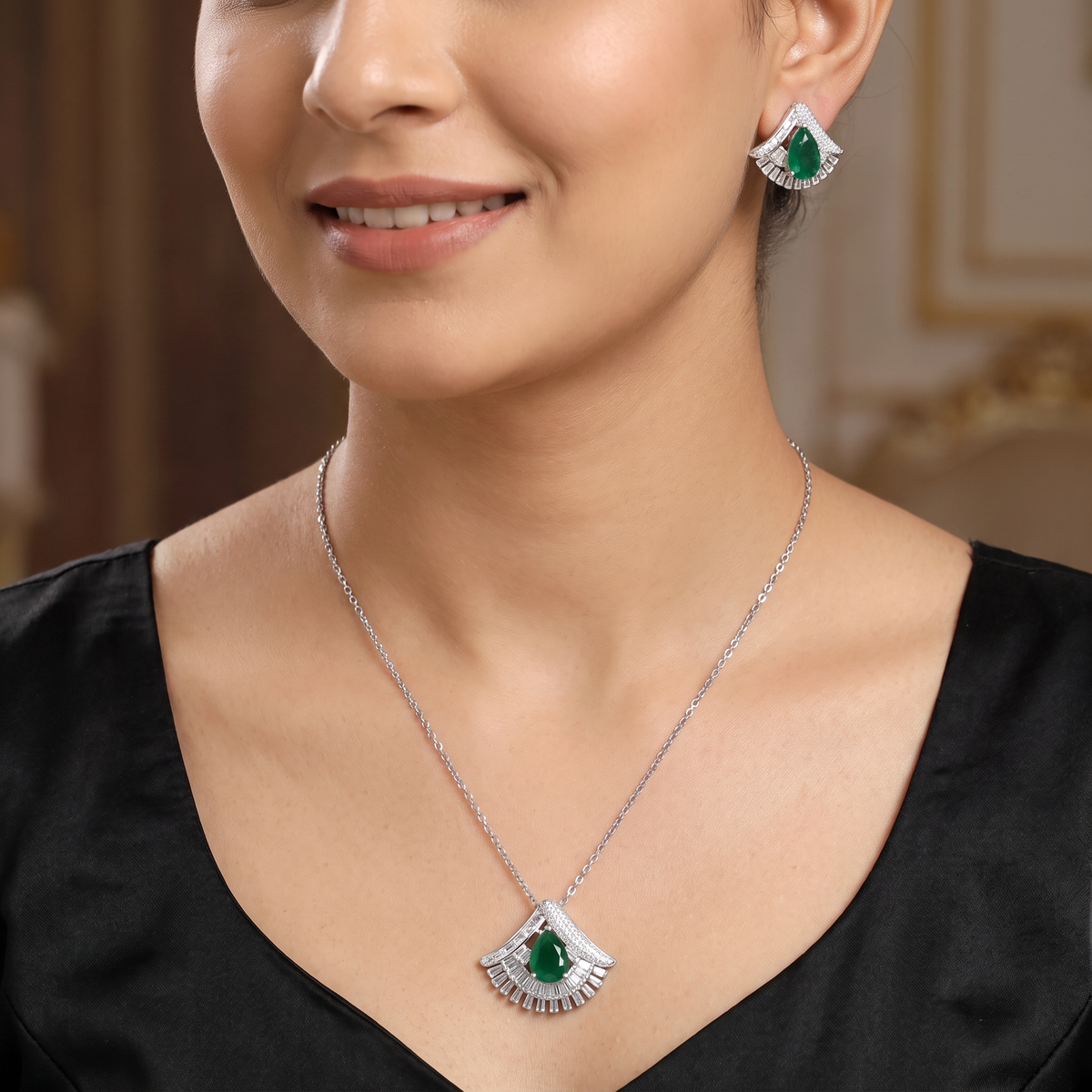 Designer chain with pendant showcasing a fan-inspired silhouette and geometric border detailing